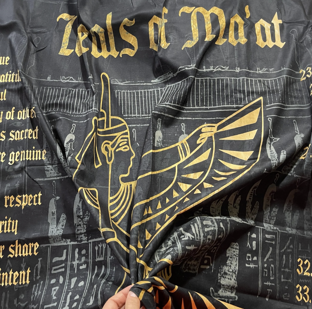 Close-up of Ma'at tapestry fabric detail